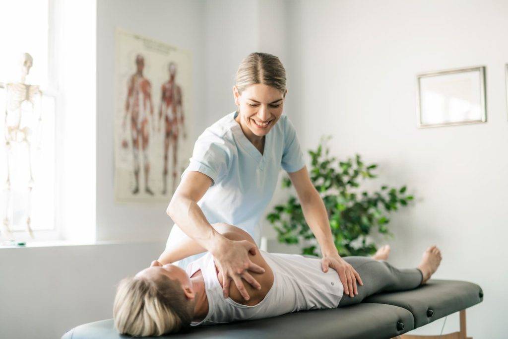 Physiotherapy session with female therapist